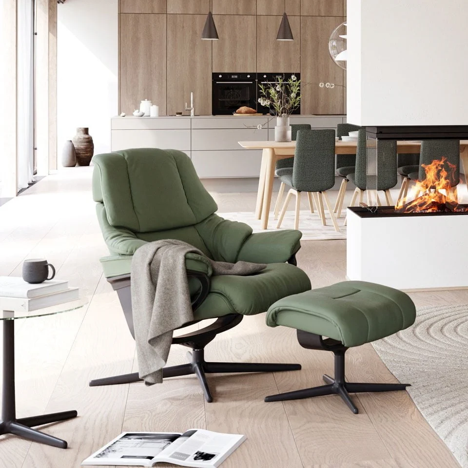 Reno_BatickThymeGreen960x960 The Most Comfortable Stressless Stressless Reno recliner with a sleek cross base in green, showcasing modern design and luxurious comfort